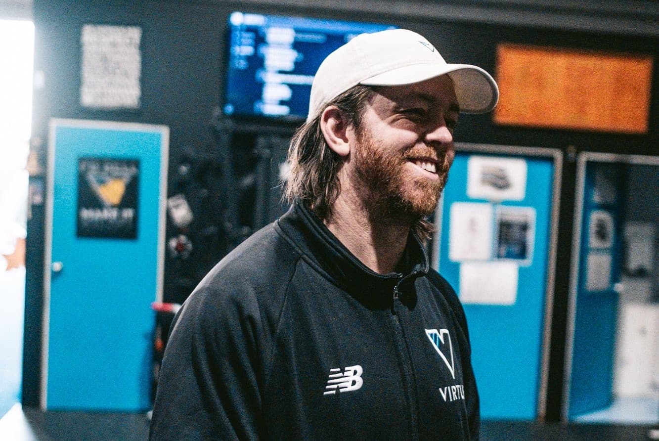Lachie Wallace sharing a candid moment on the Virtus Performance floor