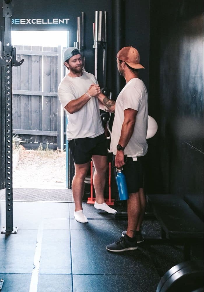 Lachie Wallace greeting a member on the Virtus Performance floor