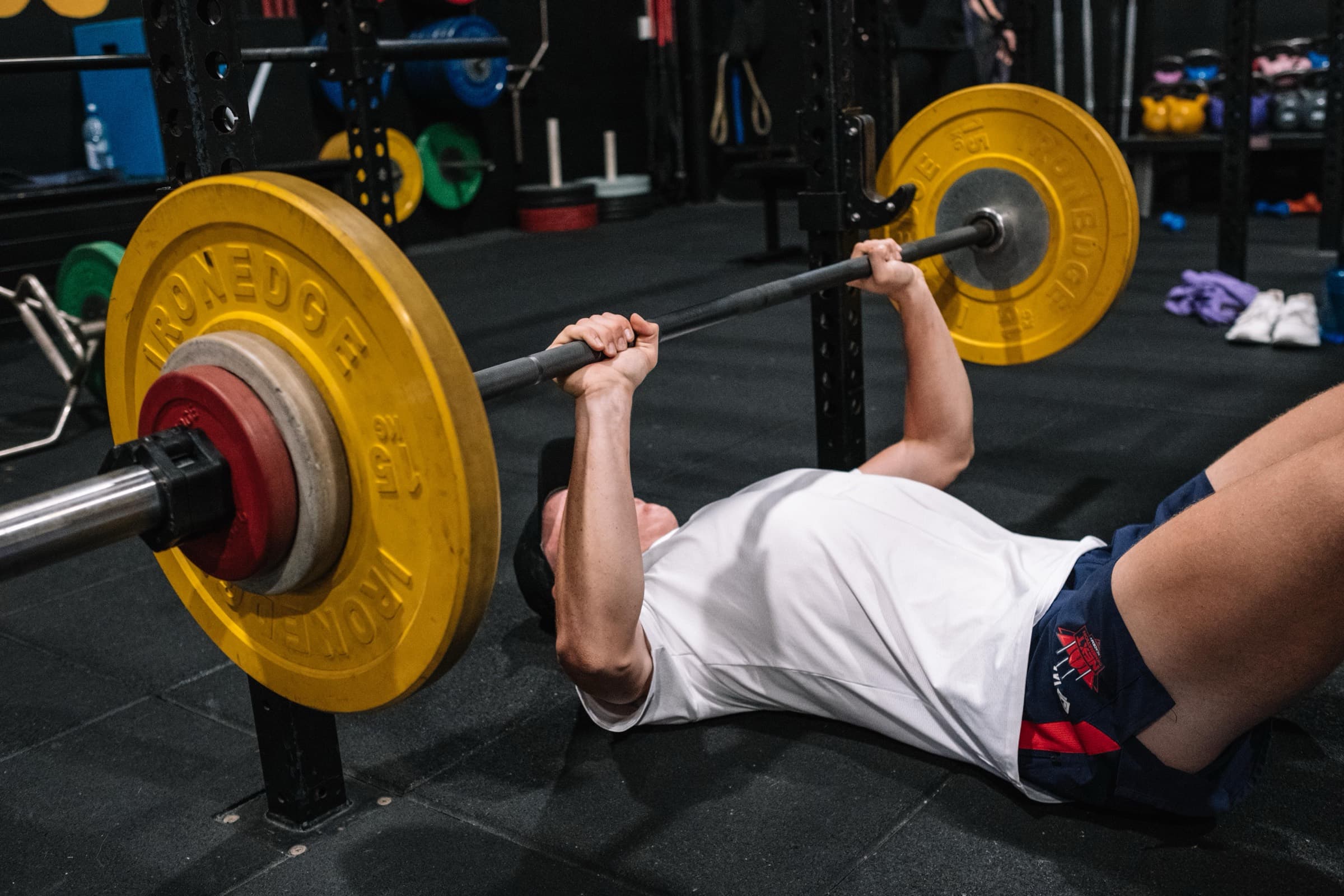 A junior athlete learning strength training at Virtus